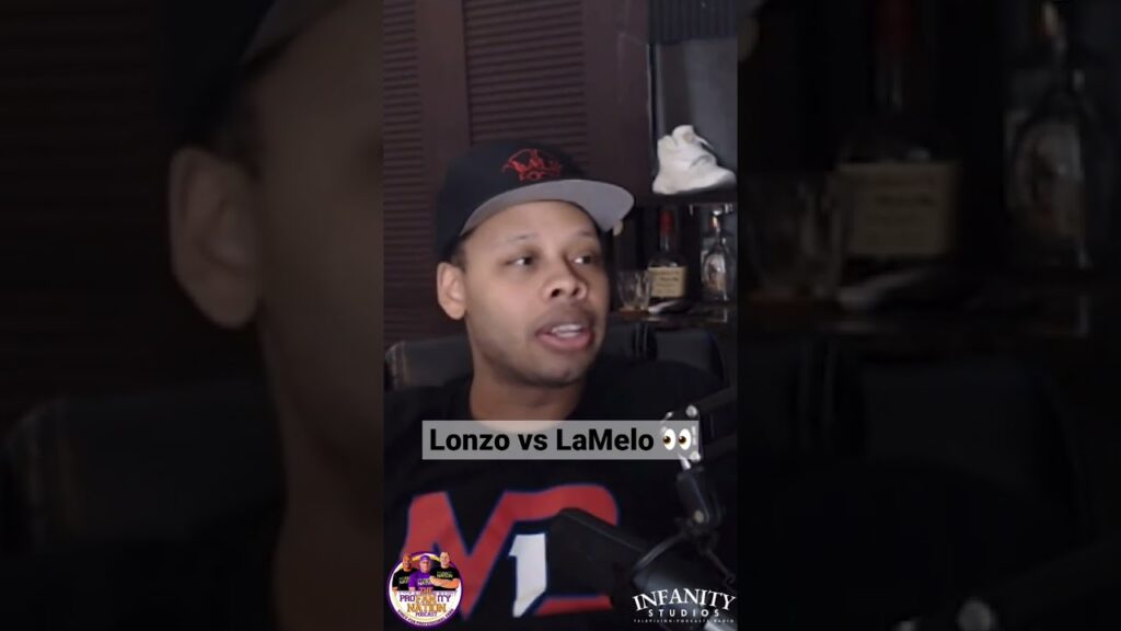 Man in a cap discussing a basketball rivalry.