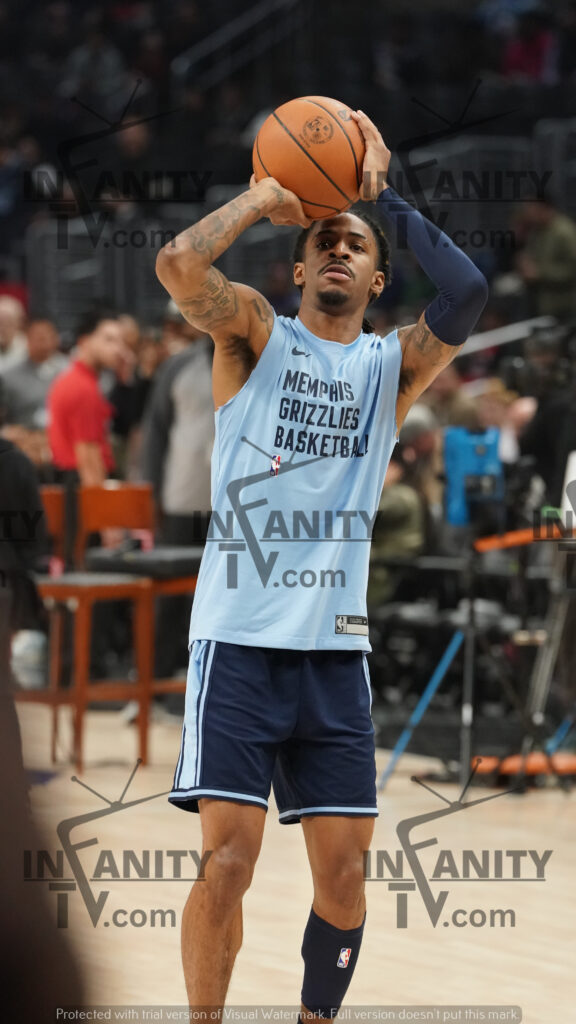 Basketball player celebrating a victory on the court.
