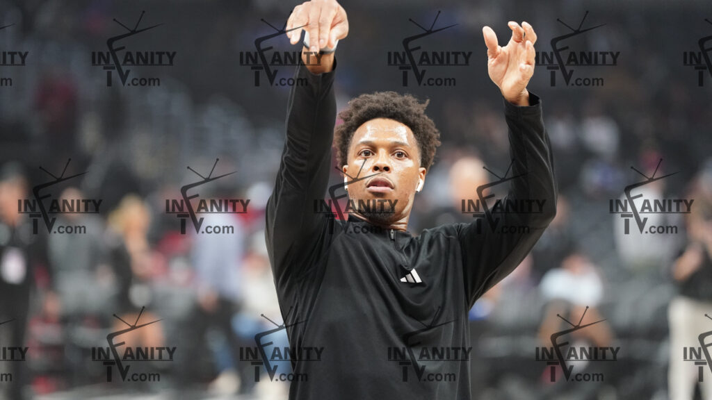Basketball player signaling during a game.