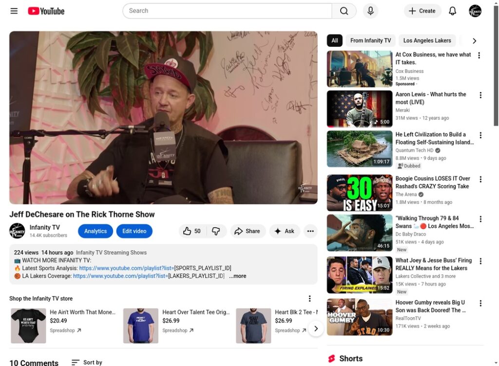 A man in a podcast studio speaking into a microphone.